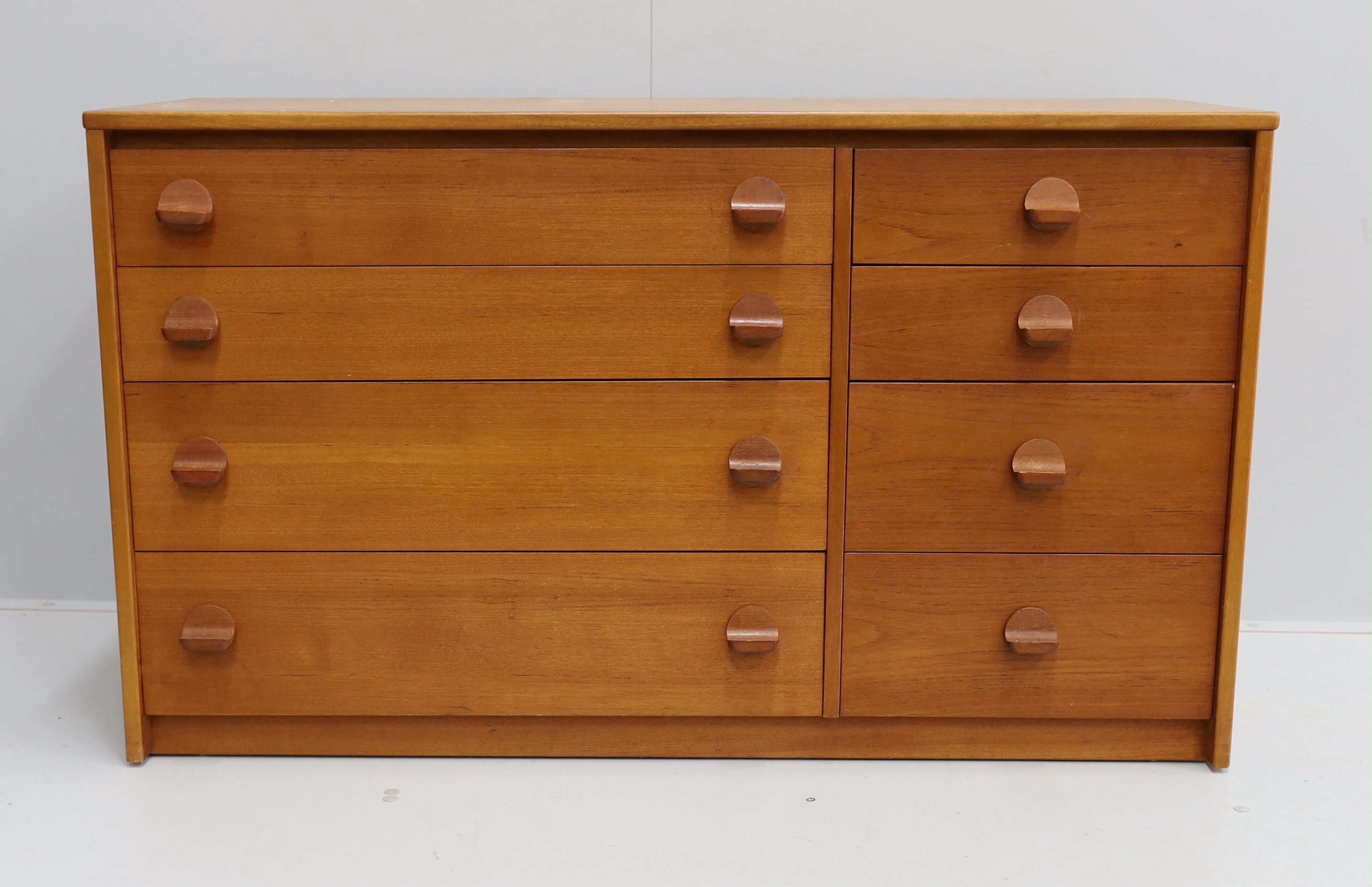 Ron Carter for Stag Furniture - A 'Cantata' teak chest of eight drawers, width 118cm, depth 44cm, height 69cm